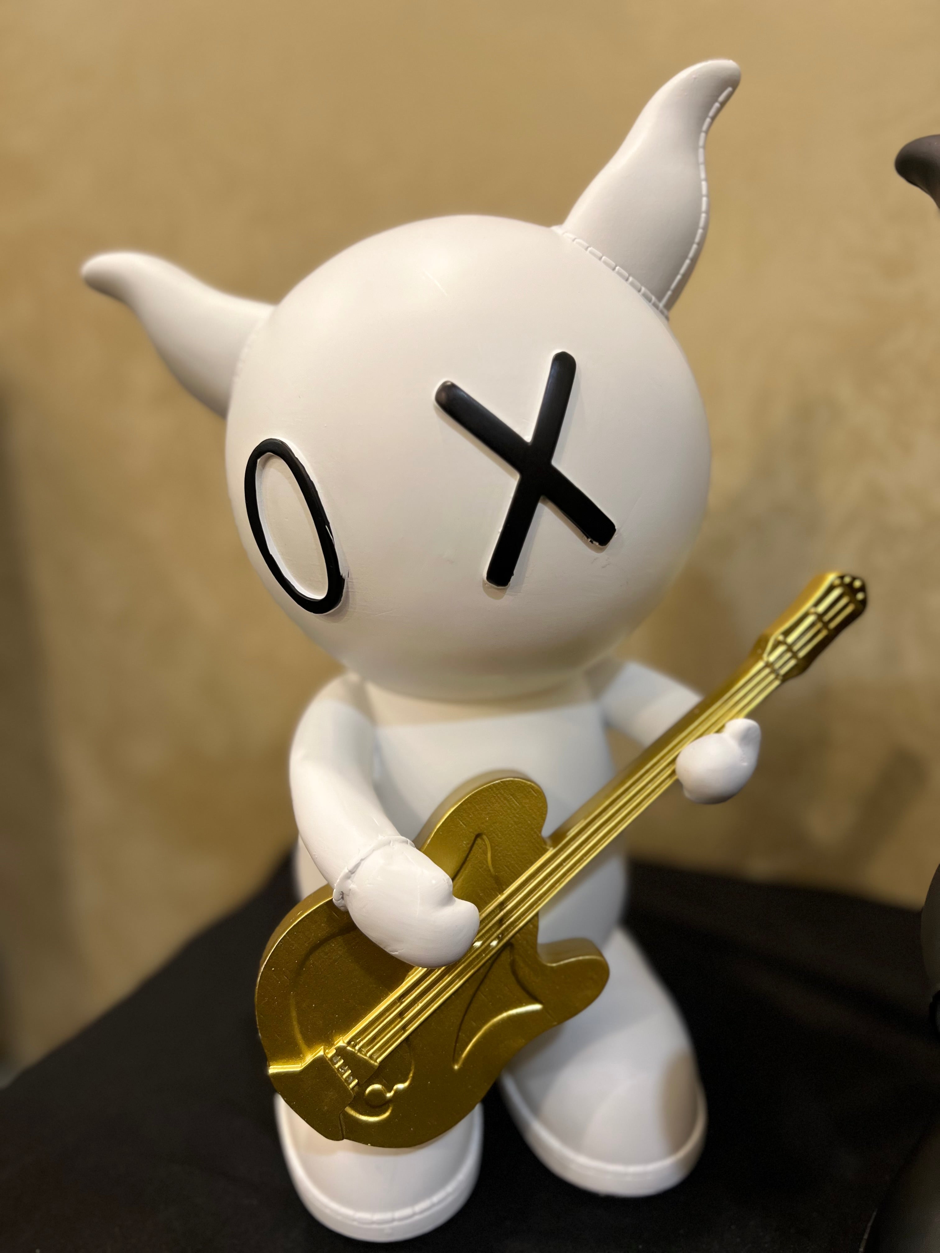 Guitar and Mic Rabbit Sculptures