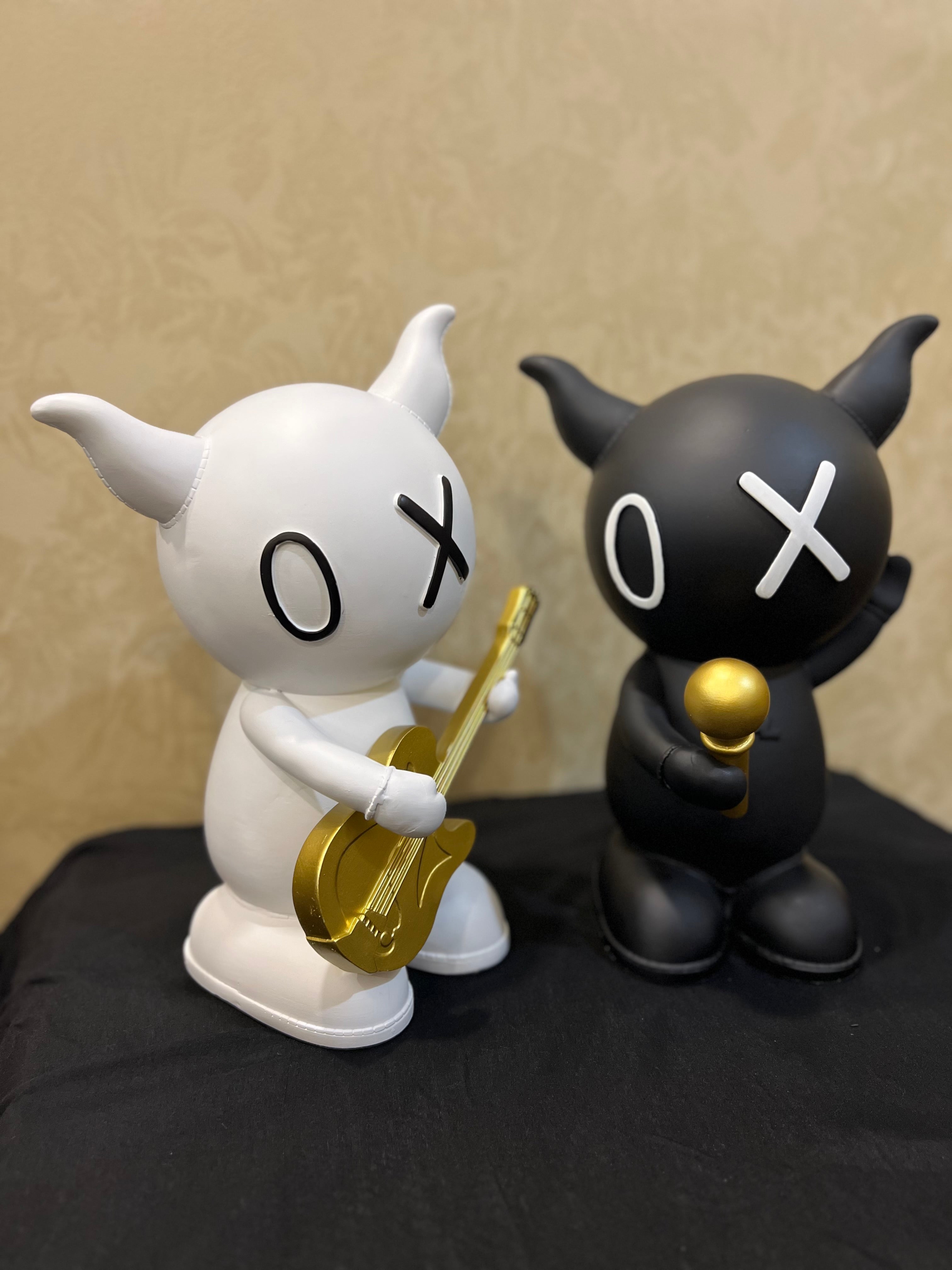 Guitar and Mic Rabbit Sculptures